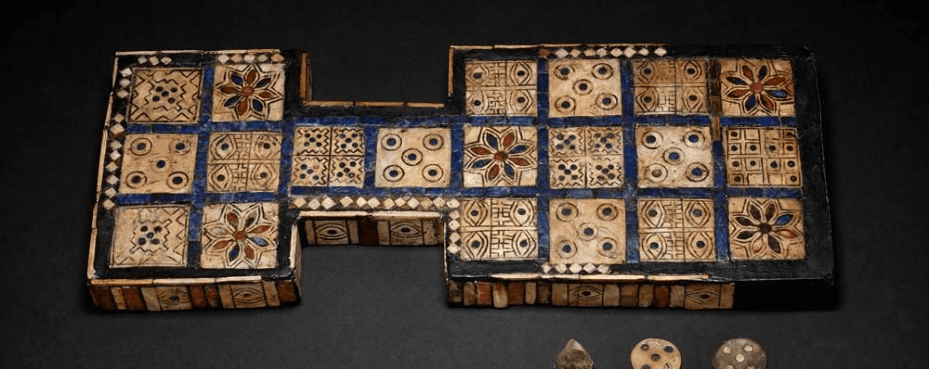 The Royal Game of Ur, the oldest playable board game in the world, originating around 4,600 years ago in ancient Mesopotamia.